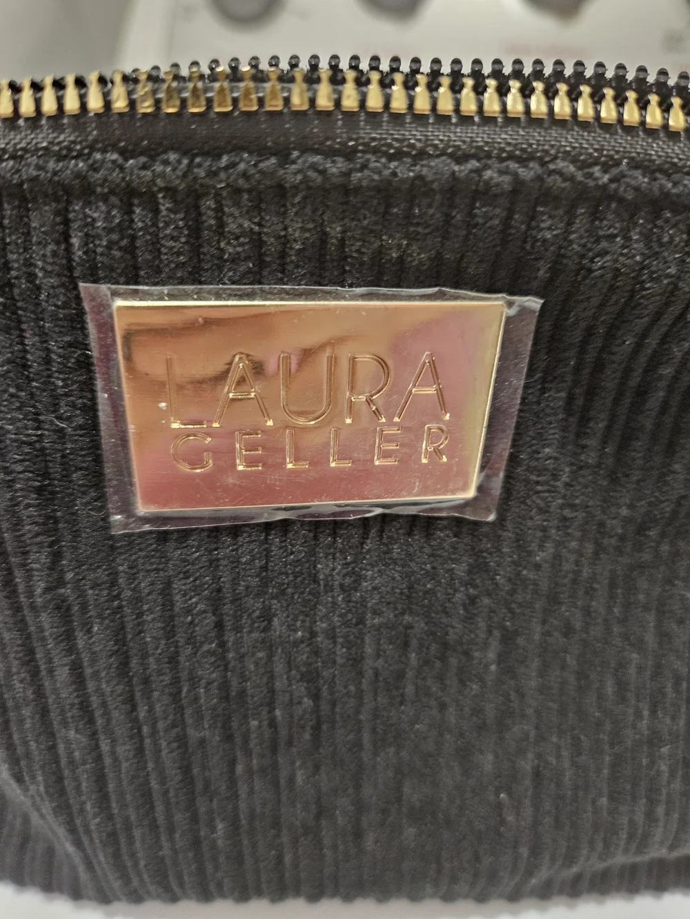 Laura Geller Black Ribbed Clutch Cosmetic Travel Bag with Gold Logo